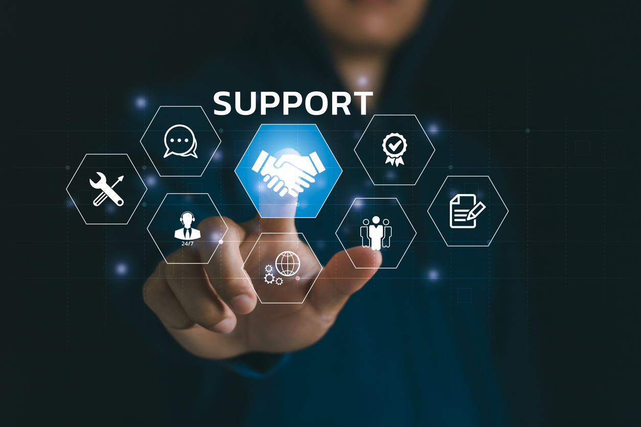 Customer support and service concept. Businessman touching virtual interface, handshake icon symbolizing partnership, assistance, helpdesk, communication, trust, technical support on digital screen.